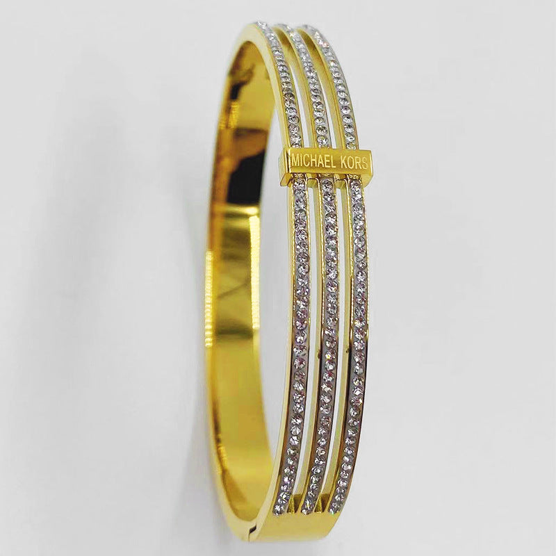 Brazalete de oro rosa de acero de titanio de diamante de tres capas y titanio de diamante de tres capas.